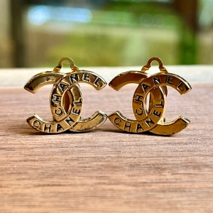 CHANEL Gold-Tone CC Chanel Engraved Vintage Clip On Earrings