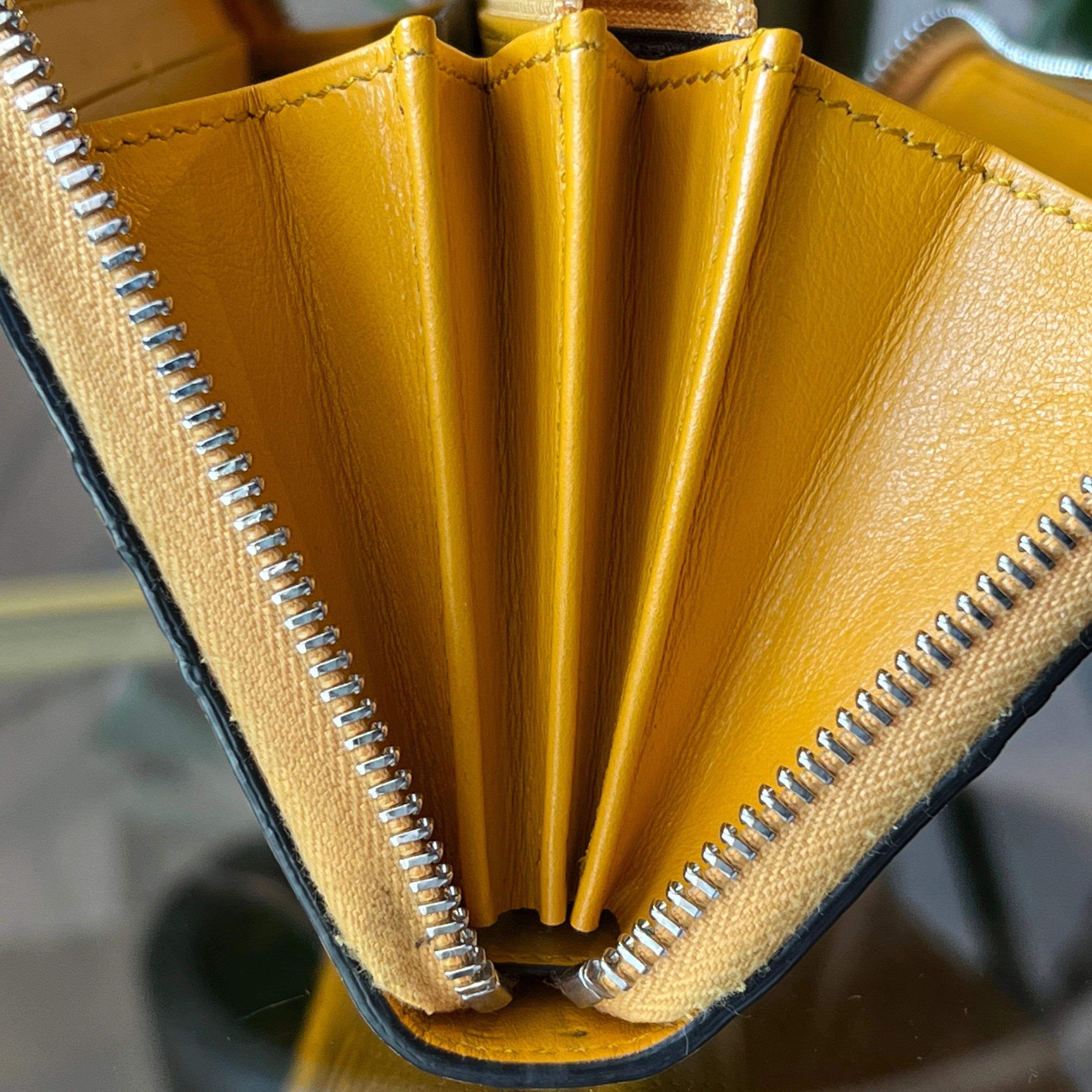 GUCCI GG Yellow Embossed Leather Zip Around Wallet